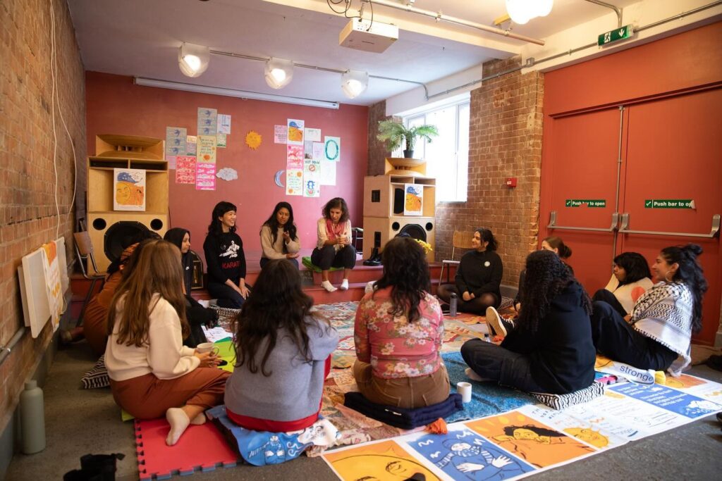 People having a meeting in a room
